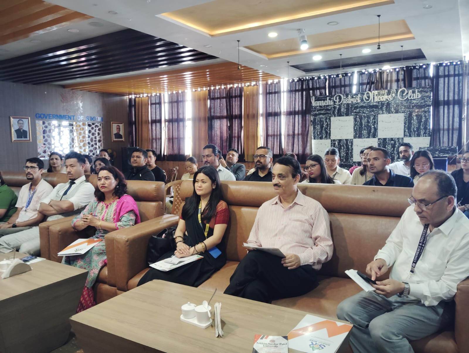 Faculty and delegates at a university seminar